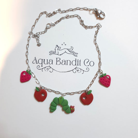 Green caterpillar charm necklace